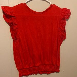 Girls red blouse, XL with ruffled sleeves.